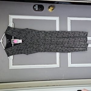 Ivonne middi dress Sleeveless shimmering stretch black small (uc)